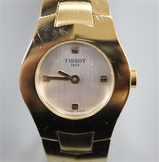 A ladys boxed Tissot watch.